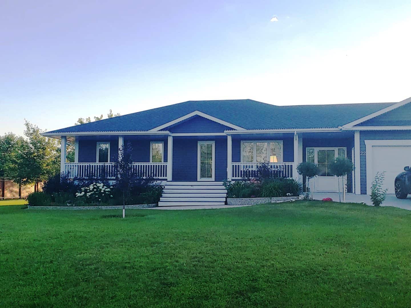 Tilt and turn windows in a blue house