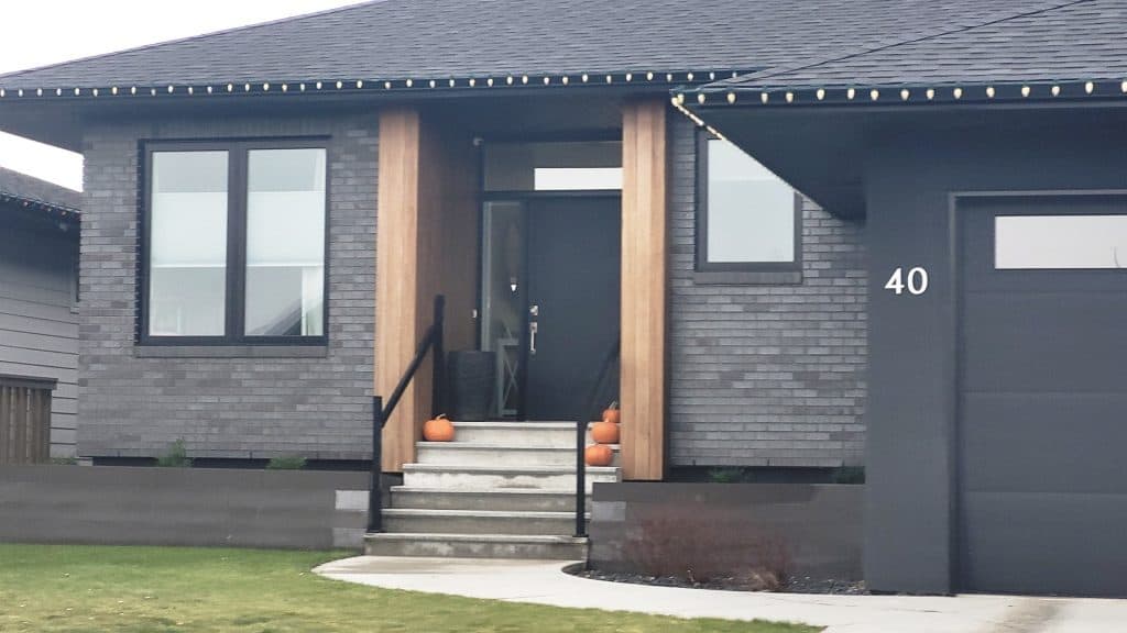 House with dark glazed windows